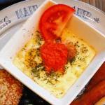 baked eggs roasted red pepper and chardonay sauce