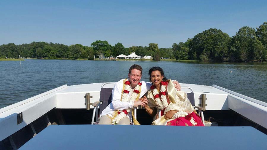 couple elopes on a boat