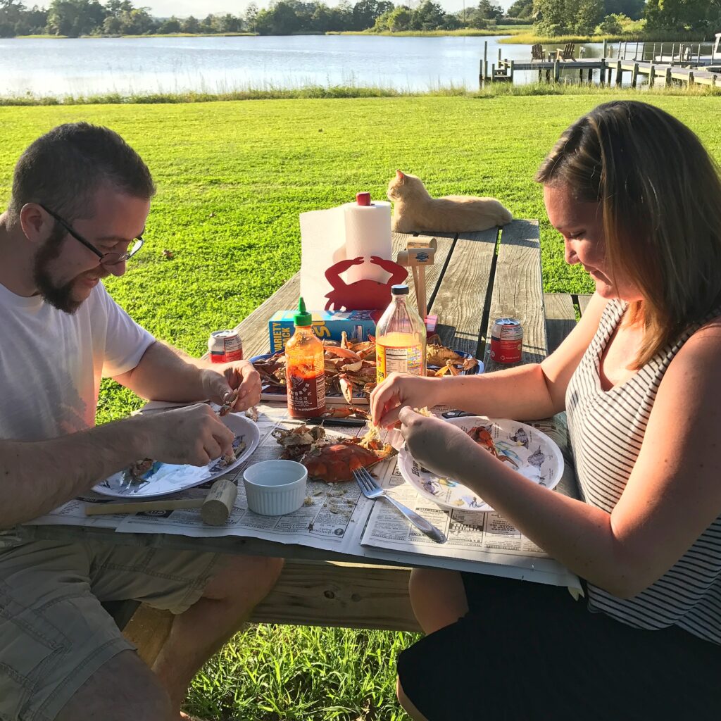 Couple enjoying fresh steamed crabs