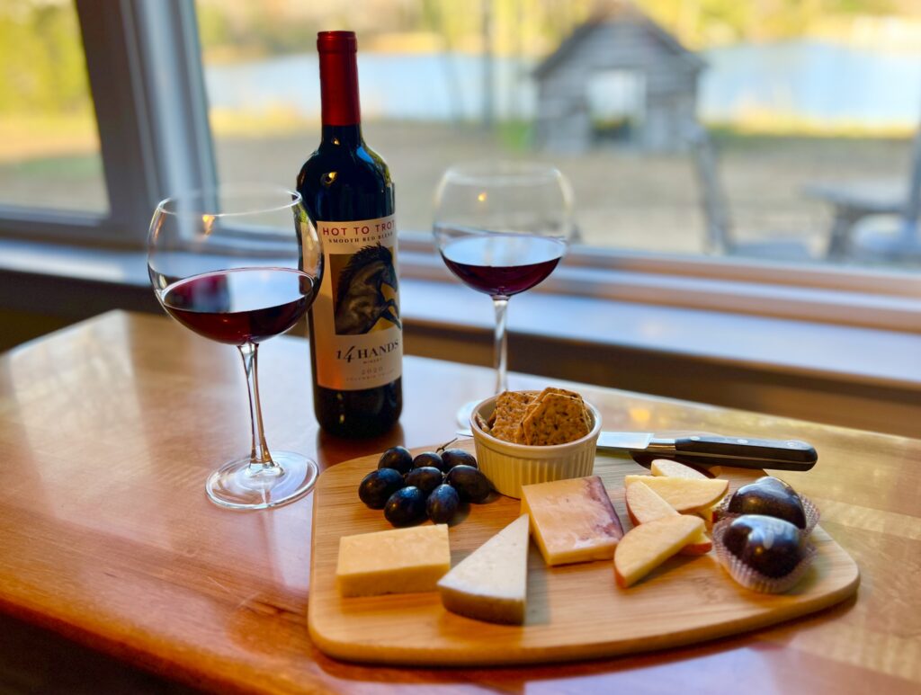 Wine and cheese board with truffles included in winter getaway specials.