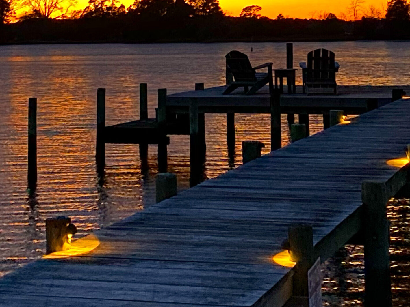 Sunsets over our dock are the best in Mathews County.