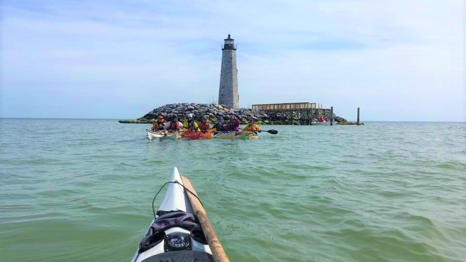 kayaking group to see lighthouse