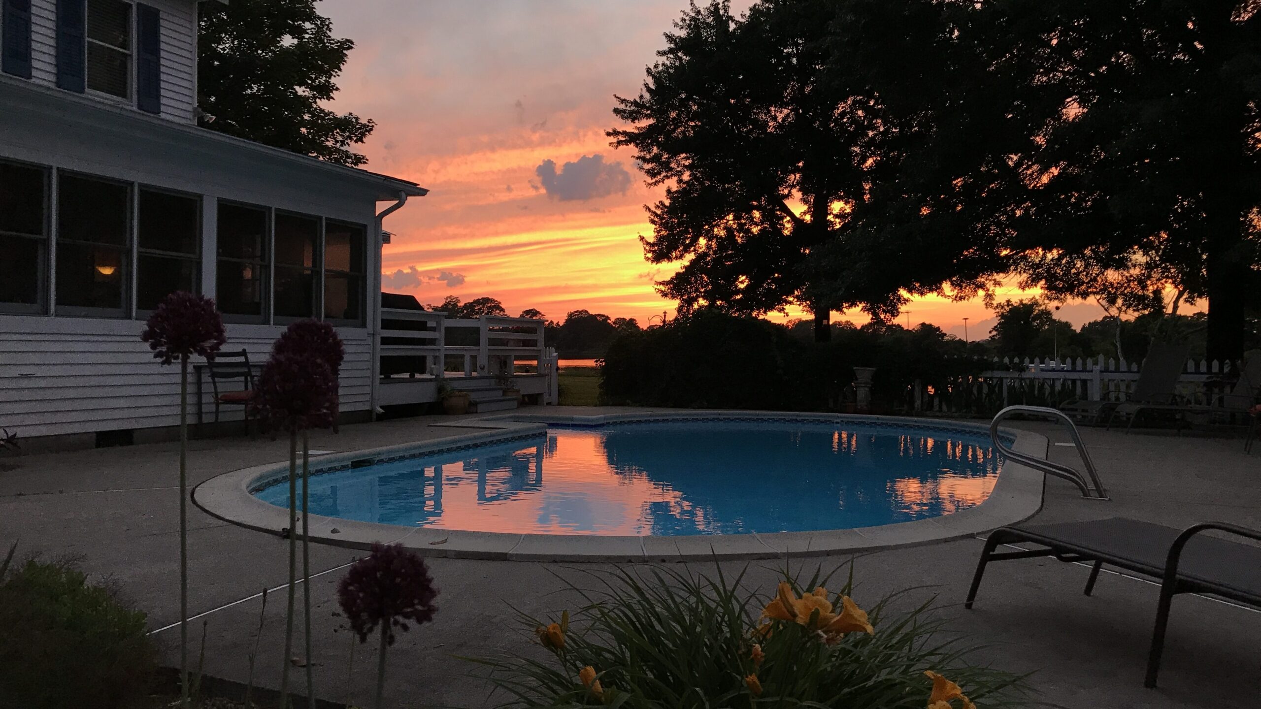 sunset over the pool