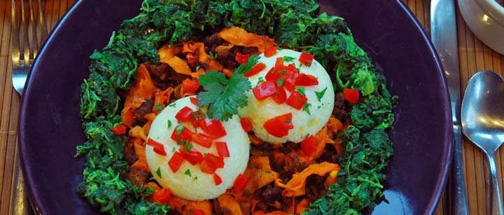 Poached eggs sweet potato and chorizo hash and creamed spinach